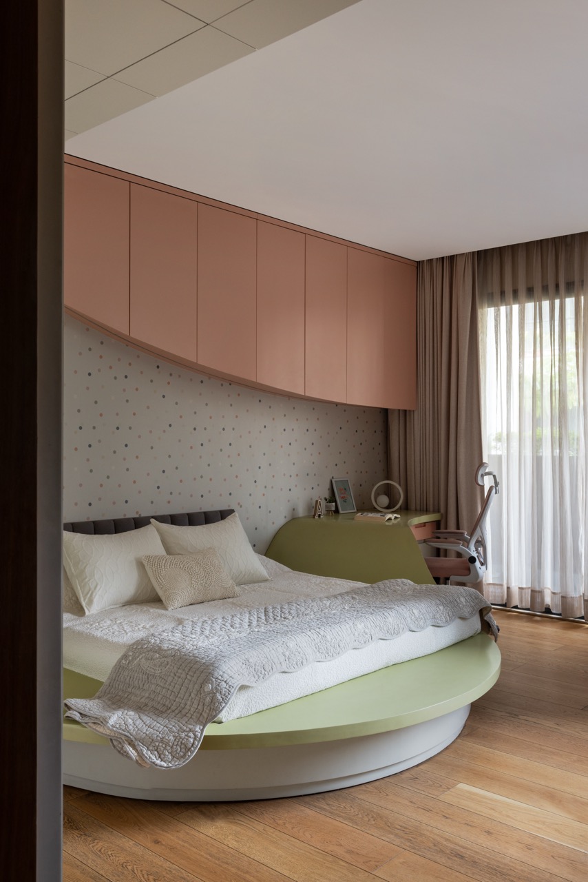 Soft curves and pastel tones are paired by flooring from BB Floors and woodwork by Turri Interiors
