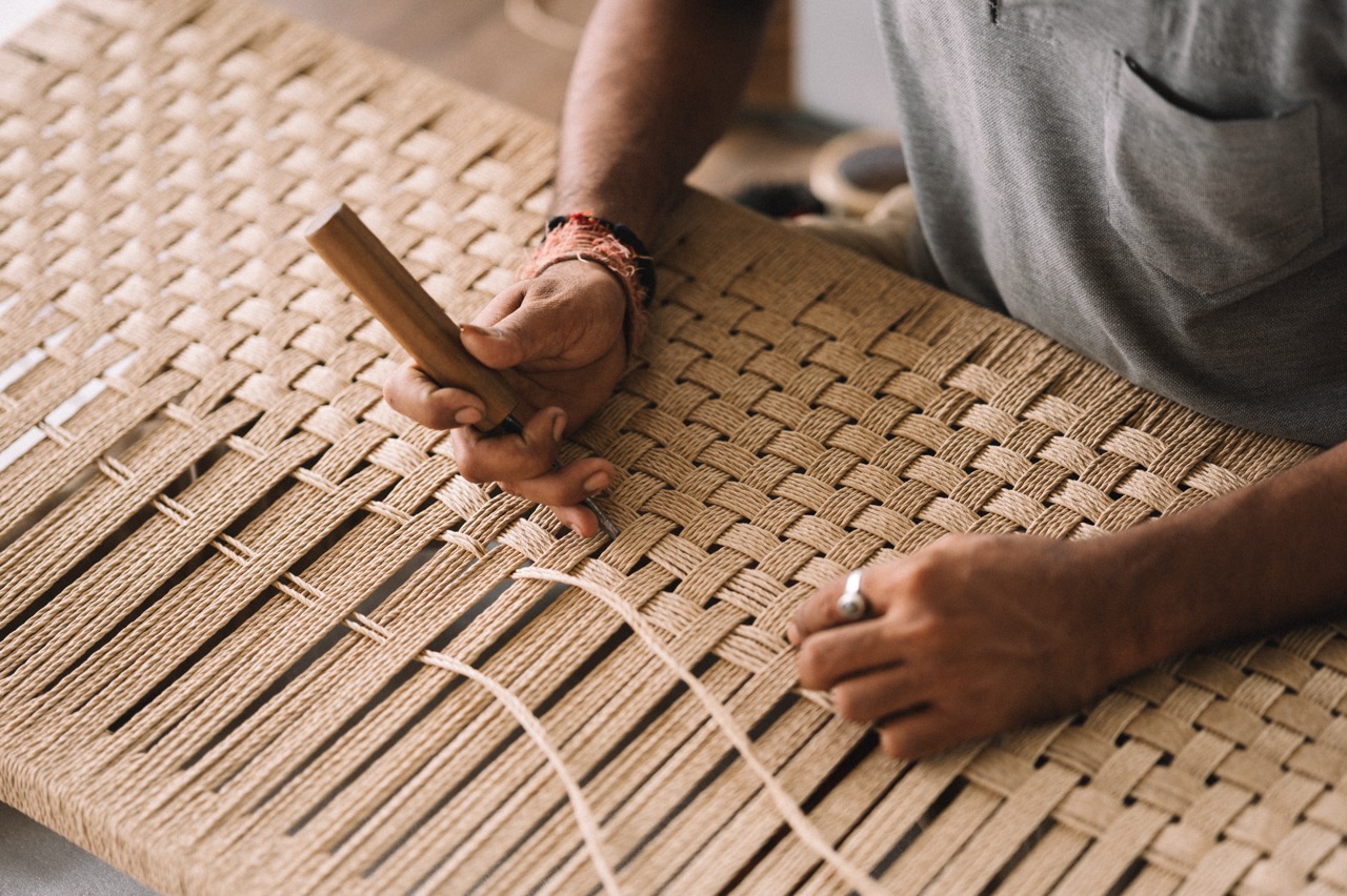 Hand-weaving in progress for a Danish cord partition by artisan Gajendra Singh